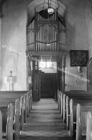 CRINGLEFORD NEAR NORWICH W.END OF CHURCH WITH FRAGMENTS & TOMB SLAB INSERTED IN WALL